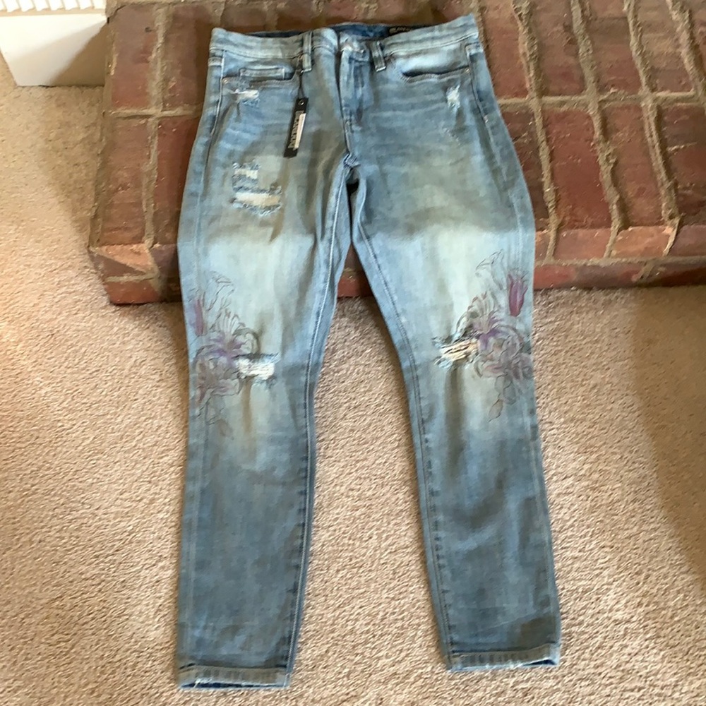 Faded skinny jeans with holes